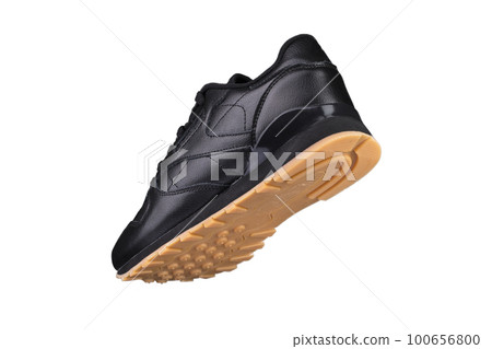 Sport shoes. Black sneaker on a white background. Shoe. 100656800