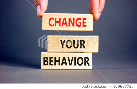 Motivation and Change your behavior symbol. Concept words Change your behavior on wooden block on a beautiful grey table grey background. Business change your behavior concept. Copy space. Motivation and Change your behavior symbol. Concept words Change your behavior on wooden block on a beautiful grey table grey background. Business change your behavior concept. Copy space. 100657723