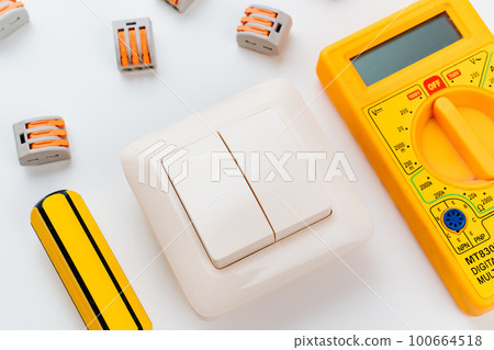 working tools for an electrician on a white background. 100664518