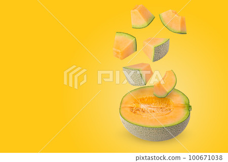Creative layout made from melon on a pastel yellow background. Fruit minimal concept and copy space. 100671038
