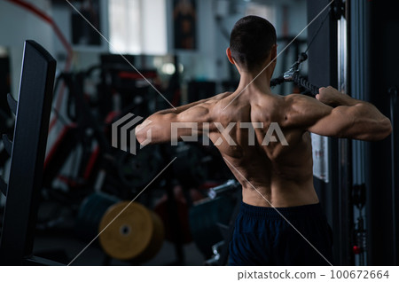 Man Thrust of the upper block to the chest in the gym. 100672664