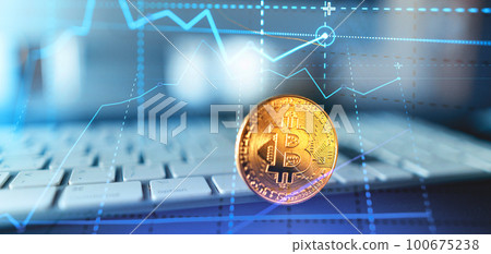 Golden bitcoins. Cryptocurrency on computer desk and Double Exposure chart Golden bitcoins. Cryptocurrency on computer desk and Double Exposure chart 100675238