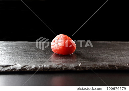 Umeboshi pickled in red perilla Umeboshi pickled in red perilla 100676579