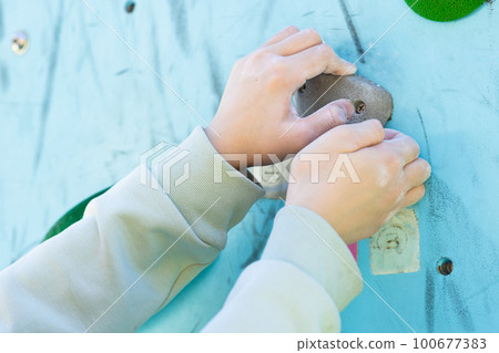child enjoying climbing 100677383