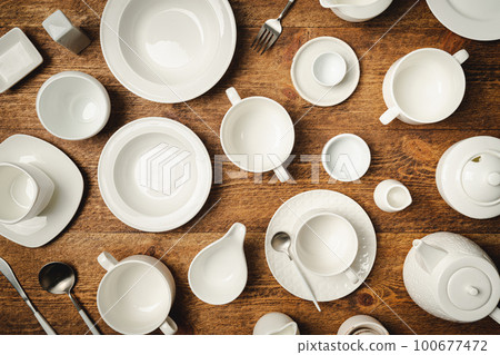 Set of white empty dishes 100677472