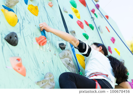 child enjoying climbing 100678456