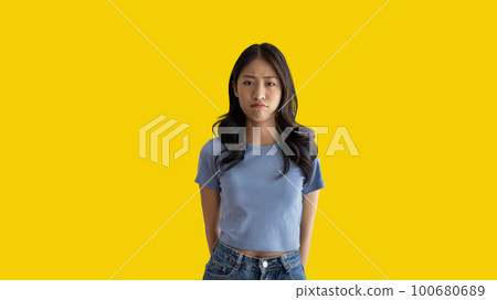 Woman made a grimace and was offended by the small matter, Sad face, Pouting sad expression, bored, Drama queen, Woman isolated from background. 100680689