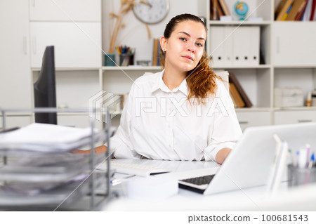 Portrait of young female office worker Portrait of young female office worker 100681543