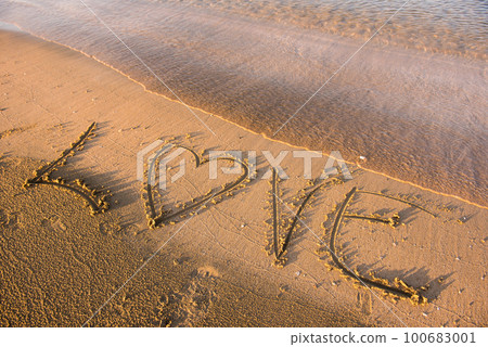 Love word written in sand Love word written in sand 100683001