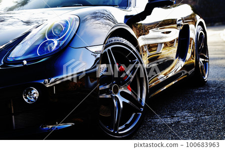 sleek black sports car 100683963