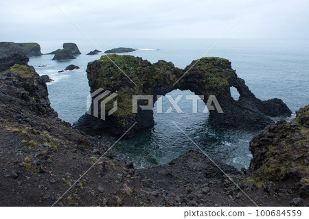 Arnarstapi basalt rock arch formation, Iceland Arnarstapi basalt rock arch formation, Iceland 100684559