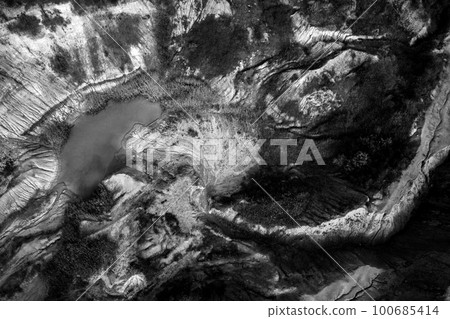 Monochrome aerial view of abandoned mine 100685414