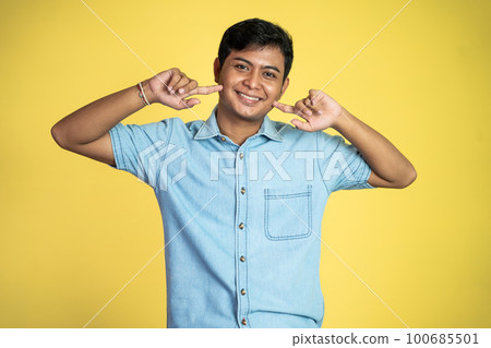 young Asian man stand with cheerful expression in isolated 100685501