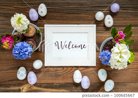 Spring Flowers With Easter Egg Decoration, English Text Welcome, Frame Spring Flowers With Easter Egg Decoration, English Text Welcome, Frame 100685667