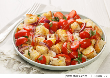 Summer Bread and tomato Salad Apulian Acquasala closeup on the plate. Horizontal 100688127