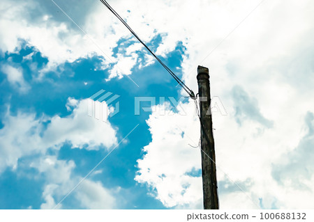 Power electric pole with line wire on colored background close up Power electric pole with line wire on colored background close up 100688132