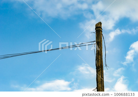 Power electric pole with line wire on colored background close up 100688133