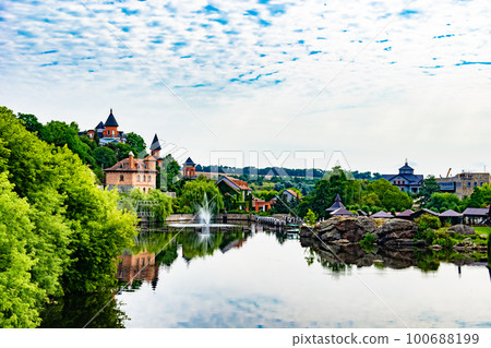 Photography on theme ancient brick castle with large tower Photography on theme ancient brick castle with large tower 100688199