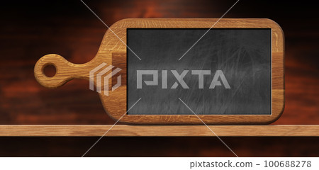 Wooden Cutting Board with a Blank Chalkboard on a Wooden Table Wooden Cutting Board with a Blank Chalkboard on a Wooden Table 100688278