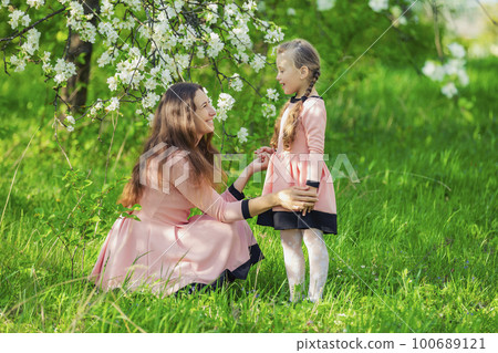mother and daughter in nature mother and daughter in nature 100689121