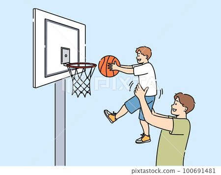 Smiling father play basketball with son Smiling father play basketball with son 100691481