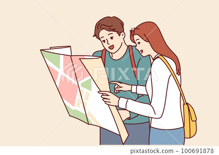 Tourist couple of man and woman looking at map choosing new city for summer travel 100691878