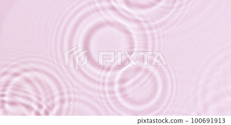 Abstract water, cosmetic background with waves and ripples and spherical granules. Concept of therapeutic moisturizing cosmetics 100691913