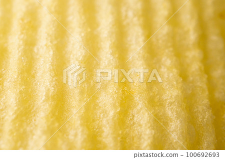 Potato chip texture background closeup Potato chip texture background closeup 100692693