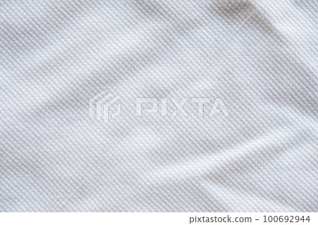 White fabric sport clothing jersey texture background White fabric sport clothing jersey texture background 100692944