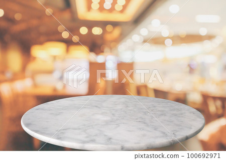 round marble table top with cafe restaurant bokeh lights abstract background for montage product display round marble table top with cafe restaurant bokeh lights abstract background for montage product display 100692971