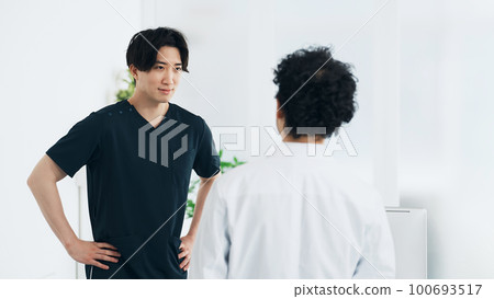 Conversing medical staff doctor nurse Conversing medical staff doctor nurse 100693517