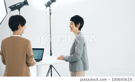 A woman interviewing 100693619