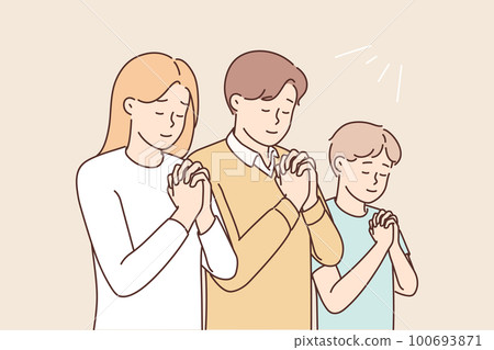 Religious family with child praying  100693871