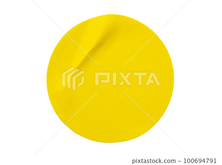 Yellow round paper sticker label isolated on white background 100694791