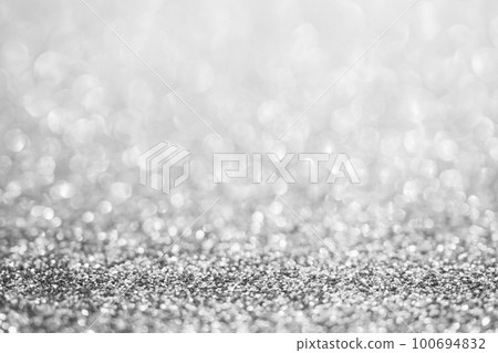 Abstract blur silver glitter sparkle defocused bokeh light background 100694832