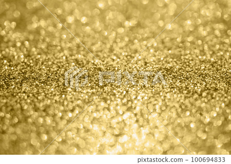 Abstract blur gold glitter sparkle defocused bokeh light background 100694833