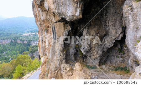 Ancient rocks high in the mountains. Beautiful natural background. Ancient rocks high in the mountains. Beautiful natural background. 100698542
