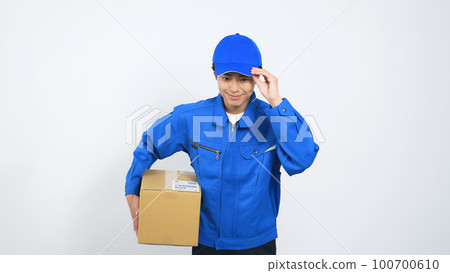 Worker with cardboard Courier delivery staff 100700610
