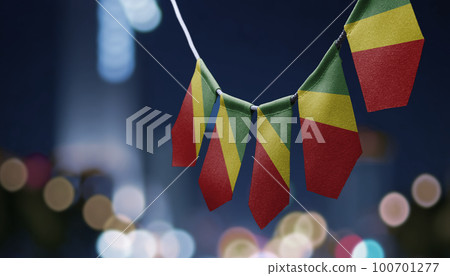 A garland of Congo national flags on an abstract blurred background A garland of Congo national flags on an abstract blurred background 100701277