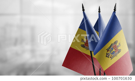 A small Moldavia flag on an abstract blurry background 100701630