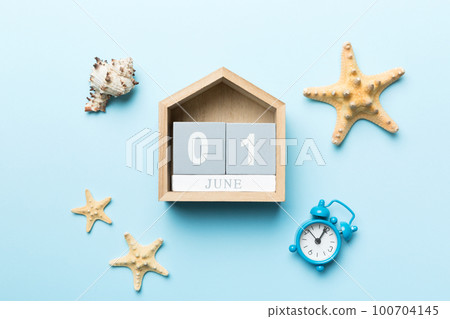 June 1th. Image of june 1 wooden calendar on colored background. Summer day. Empty space for text June 1th. Image of june 1 wooden calendar on colored background. Summer day. Empty space for text 100704145