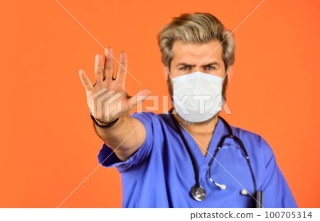 Stop epidemic. Virus concept. Epidemic infection. Critical number or density of susceptible hosts. Epidemic threshold. Man in medical lab. Protective mask. Open palm stop gesture. Danger zone 100705314