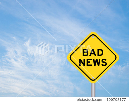 Yellow transportation sign with word bad news on blue color sky background Yellow transportation sign with word bad news on blue color sky background 100708177