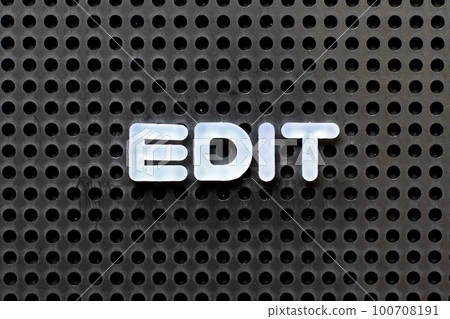 White color alphabet with word edit on black pegboard background White color alphabet with word edit on black pegboard background 100708191
