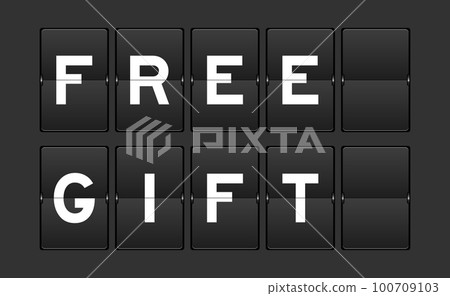 Black color analog flip board with word free gift on gray background 100709103