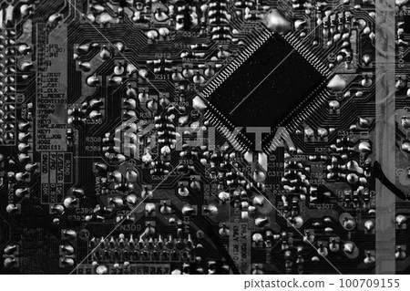Printed circuit top view with microchip and capacitors, close up Printed circuit top view with microchip and capacitors, close up 100709155