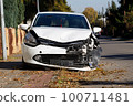 Front of white coloured car large damaged and broken by car park accident can't go on 100711481