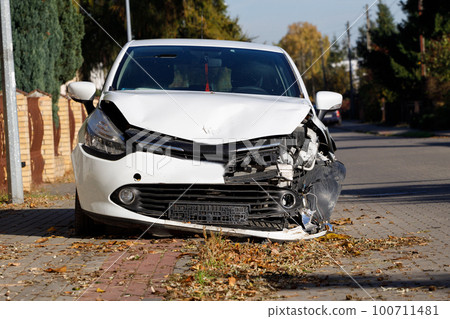 Front of white coloured car large damaged and broken by car park accident can't go on Front of white coloured car large damaged and broken by car park accident can't go on 100711481