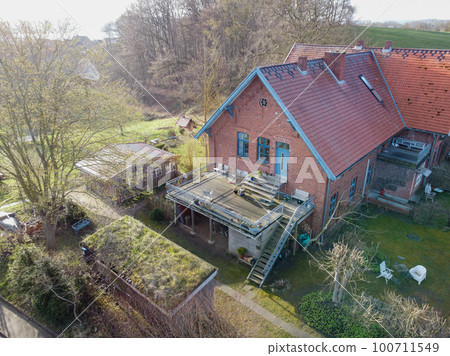 Beautiful house or cottage in the hills spring time. Brick House 100711549