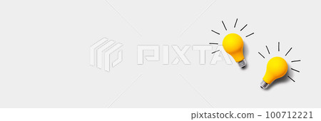 Yellow light bulbs - flat lay 100712221